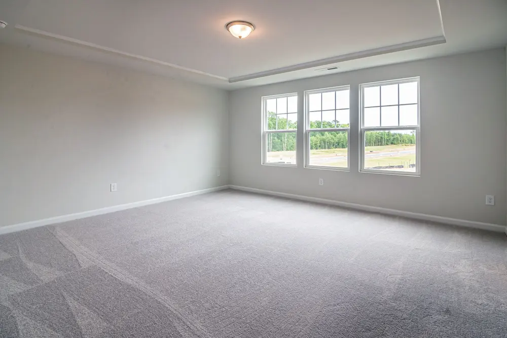 Carpet — bright spacious empty room large windows plush — near Orange, CA