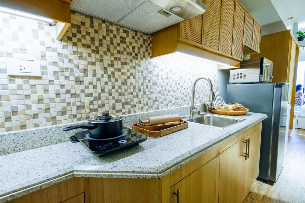 Countertops — bright modern kitchen granite countertop stainless — Kitchen & Bath Remodeling by OC Floor Guy