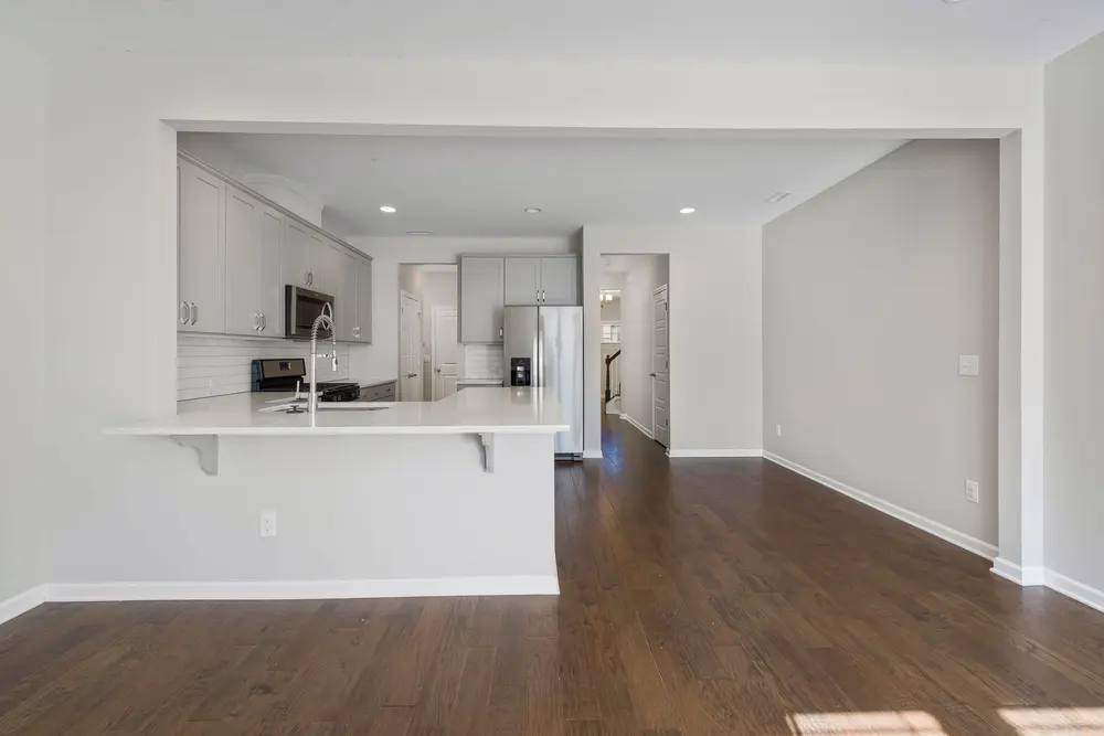 Hardwood flooring — bright empty modern kitchen — near Westminster, CA