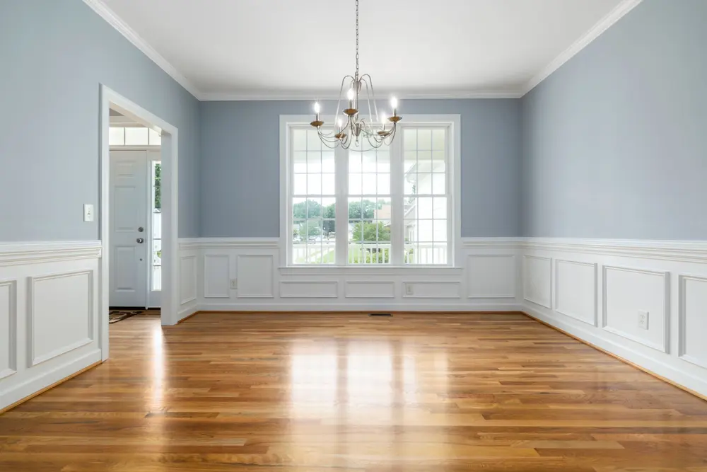 Hardwood flooring — bright empty room chandelier — near Stanton, CA