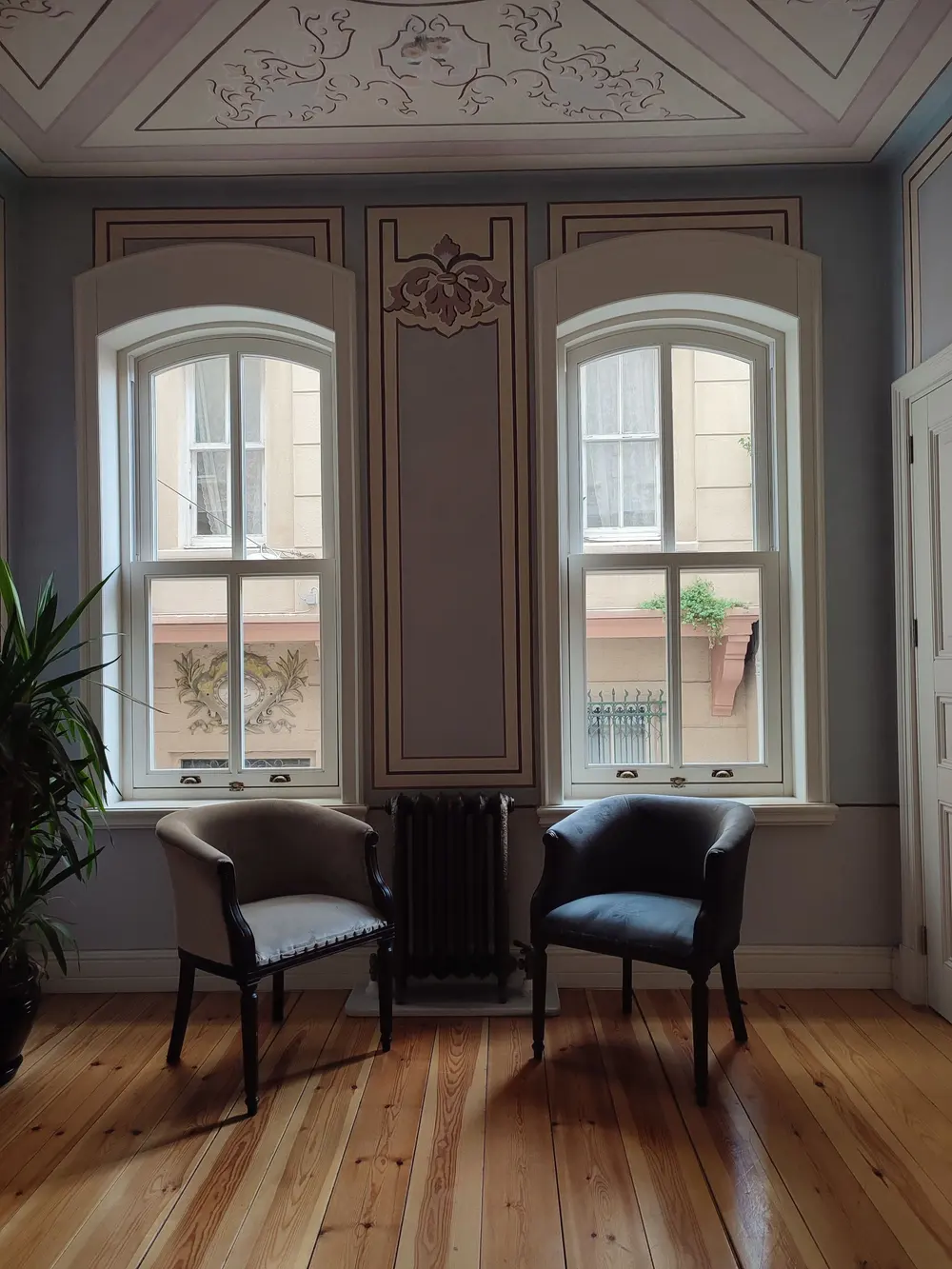 Refinished wide-plank hardwood flooring with a fresh finish